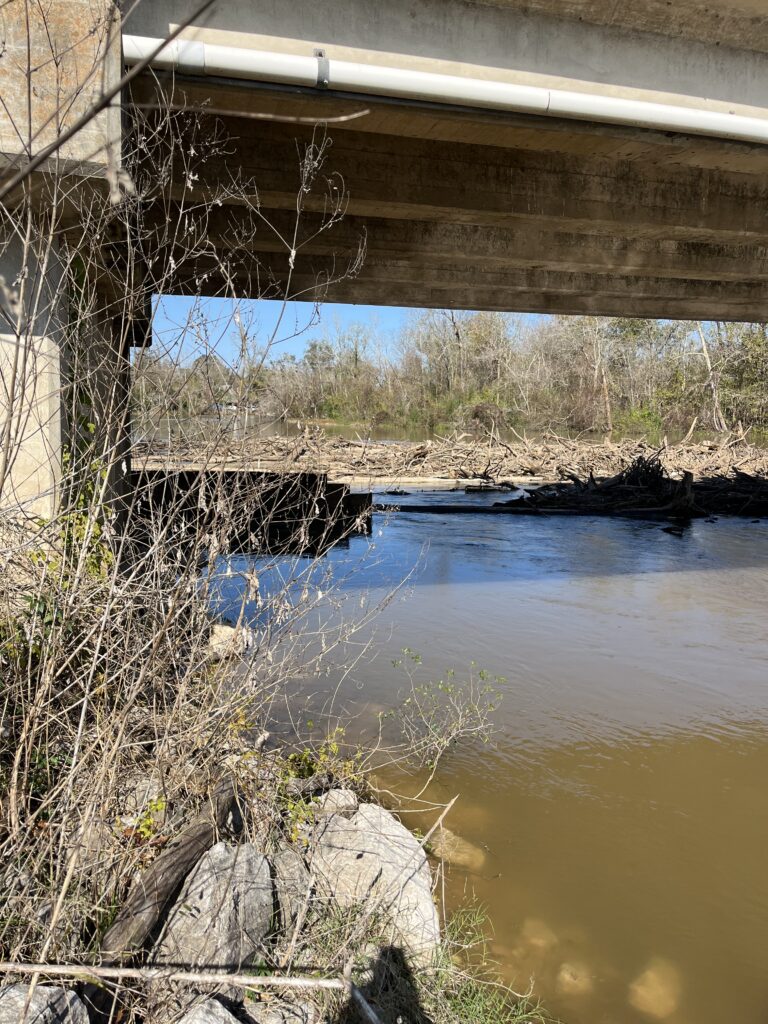 Debris accumulated under the Sabine River Bridge located on Highway 12 in Newton County, Texas.