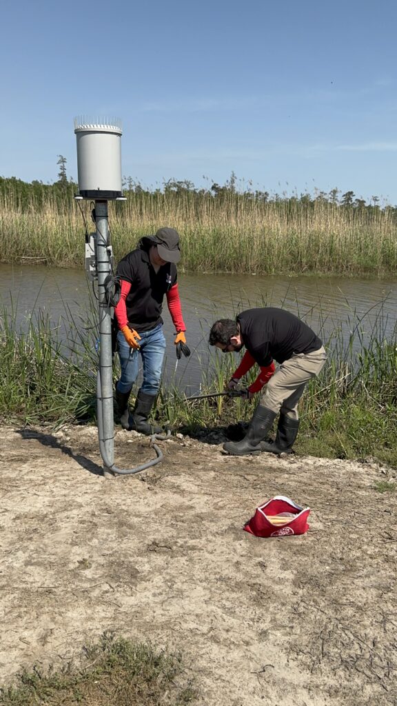 Dat Phan and Just Mahan from Lamar University inspect SETEXAS R.A.I.N. equipment